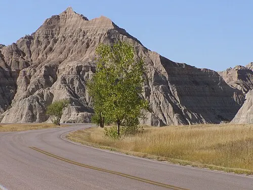 The Saddle Pass trailhead at the foot of the Badlands Wall, where the route climbs the eroded slope.
