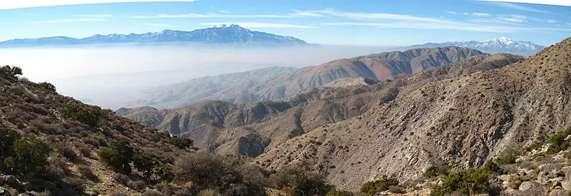 The wide view from Keys View, looking down over the Coachella Valley to distant mountains from a high desert overlook.