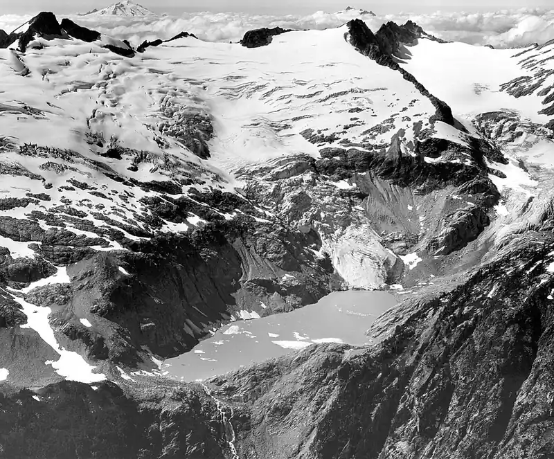 Klawatti and North Klawatti glaciers spilling off a rocky ridge north of Eldorado Peak.