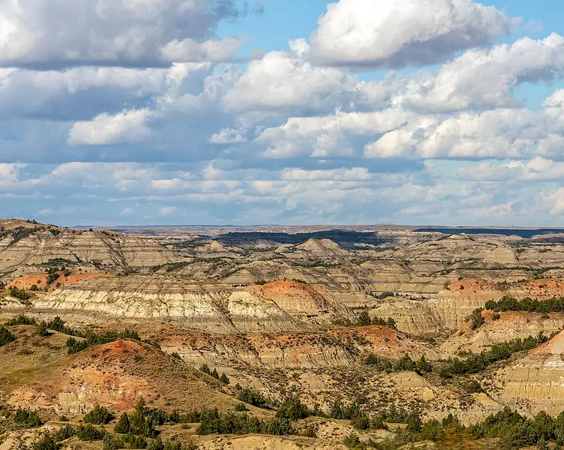 Eroded badlands buttes of Painted Canyon seen from the I-94 rim overlook at Theodore Roosevelt National Park, North Dakota.