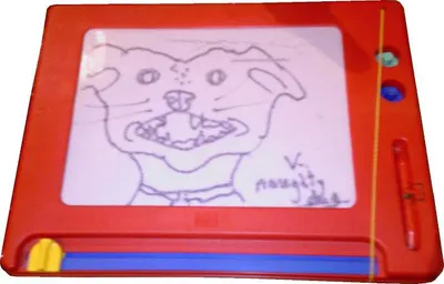 An erasable magnetic drawing tablet with a doodle still on its screen.